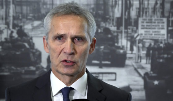 NATO Secretary General Jens Stoltenberg gives a statement at the "Berlin Wall Museum" in Berlin, Germany, on Thursday.