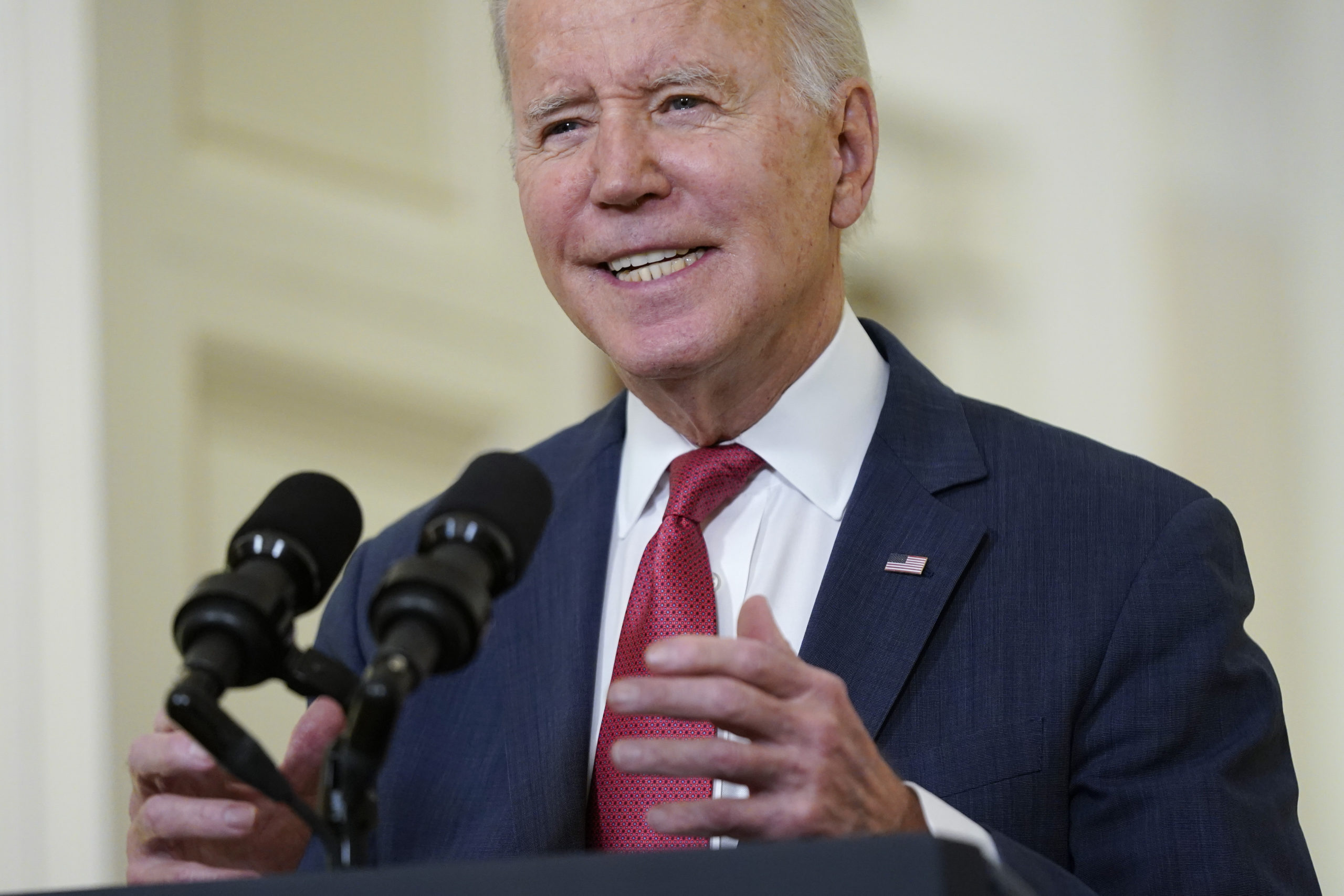 President Joe Biden speaks in the East Room of the White House ahead of the holidays on Thursday.
