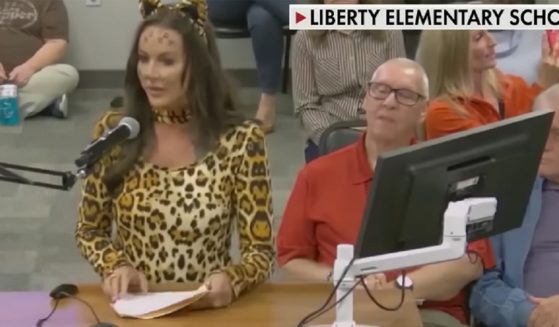 Lindsey Graham, a mother and activist, wears a cat costume to a school board meeting in Arizona in November.