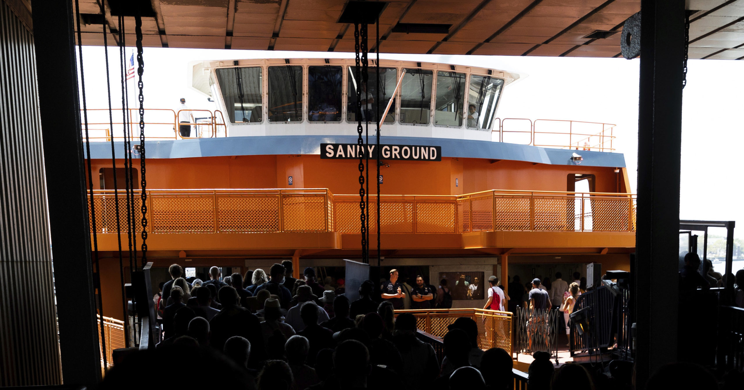 People board the Staten Island Ferry boat Sandy Ground in the Whitehall Terminal on Aug. 4 in New York.