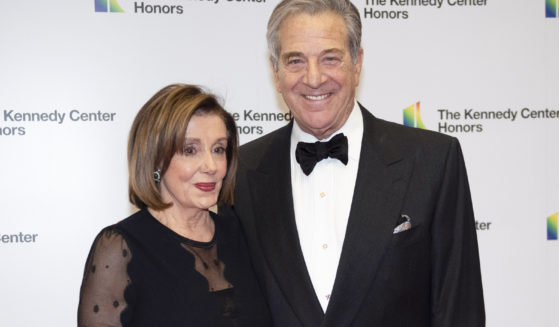 Speaker of the House Nancy Pelosi and her husband, Paul Pelosi, arrive at the State Department for the Kennedy Center Honors State Department Dinner, in Washington, D.C., on Dec. 7, 2019.