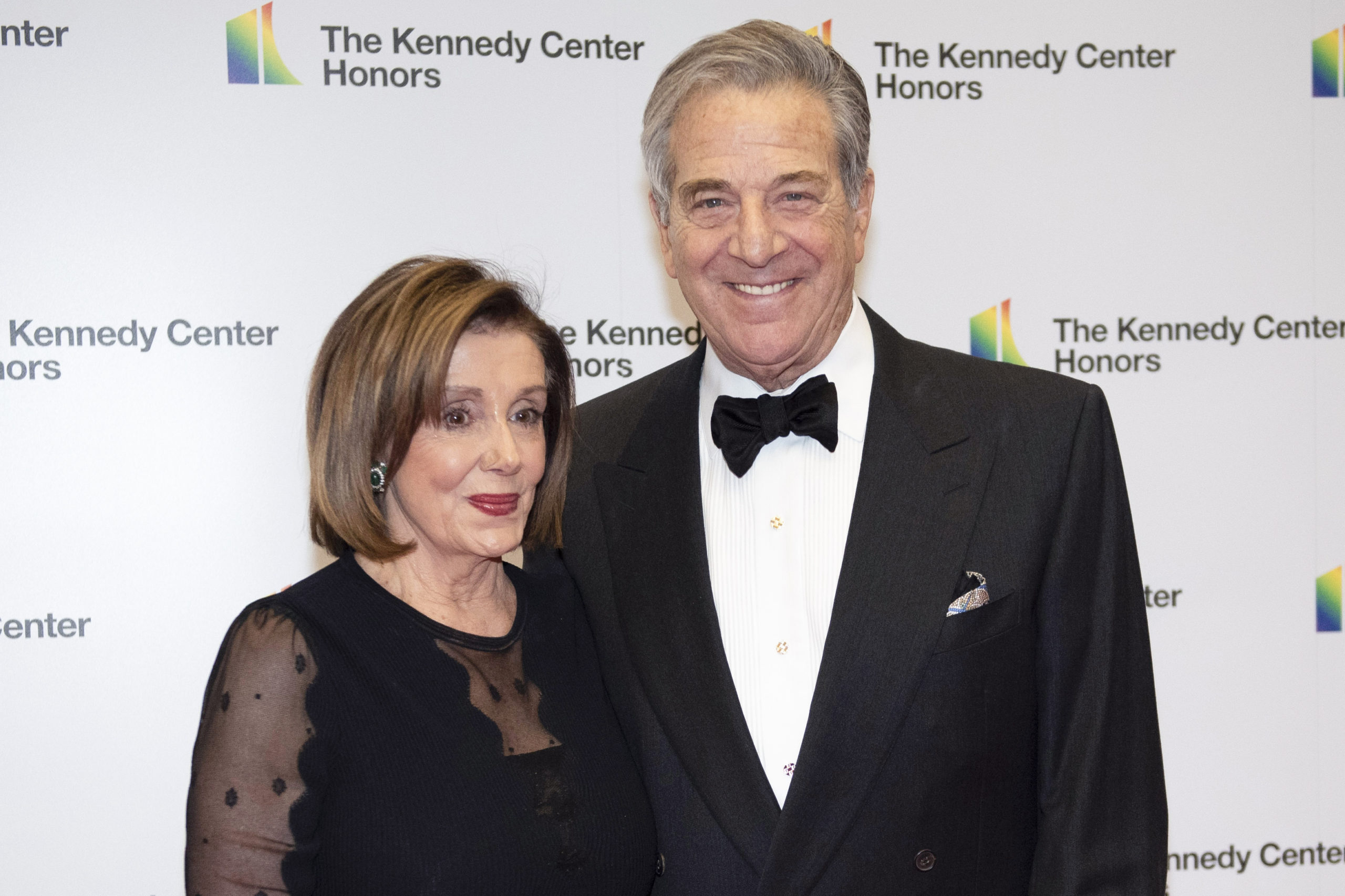 Speaker of the House Nancy Pelosi and her husband, Paul Pelosi, arrive at the State Department for the Kennedy Center Honors State Department Dinner, in Washington, D.C., on Dec. 7, 2019.