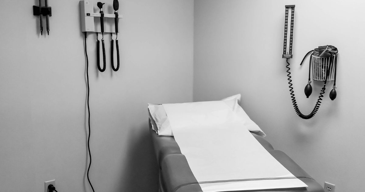 A doctor's examination room is seen in this stock image.