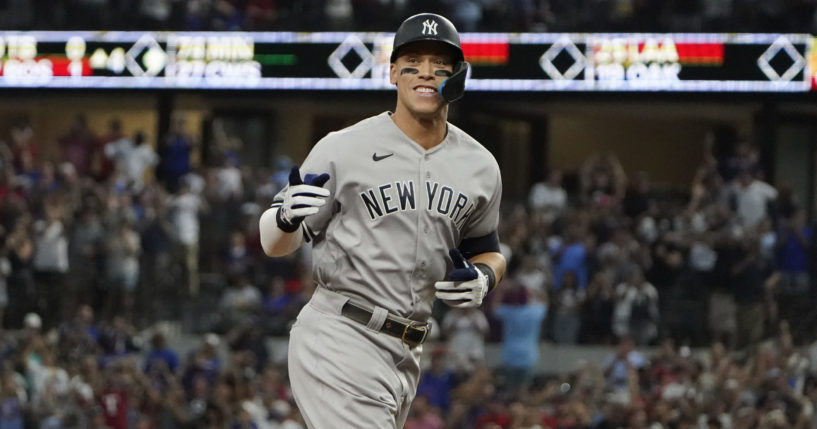 New York Yankees slugger Aaron Judge runs the bases after hitting a solo home run, his record-breaking 62nd of the season, during the first inning of a game against the Texas Rangers in Arlington, Texas, on Oct. 4.
