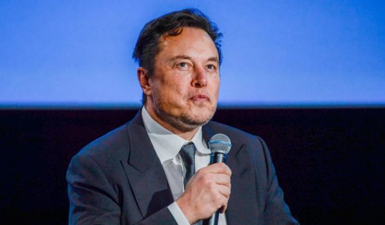 Tesla CEO Elon Musk looks up as he addresses guests at the Offshore Northern Seas 2022 (ONS) meeting in Stavanger, Norway, on Aug. 29.