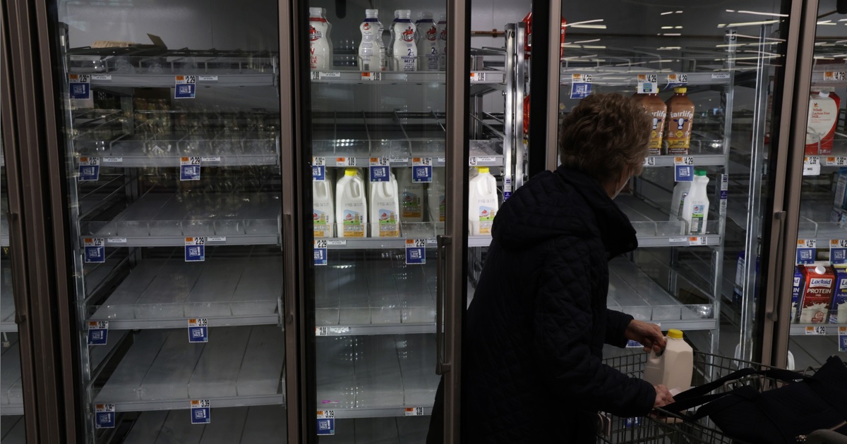 A January file photo in Springfield, Virginia, shows supermarket shelves nearly empty thanks to supply chain disruptions and back-to-back snowstorms.