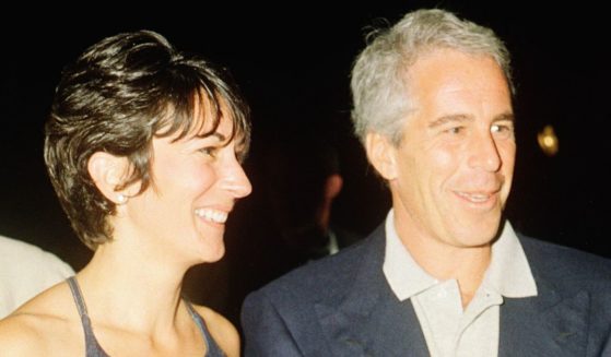 Ghislaine Maxwell and Jeffrey Epstein pose for a portrait during a party at the Mar-a-Lago club, Palm Beach, Florida, on Feb. 12, 2000