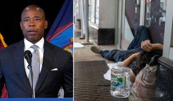 New York City Mayor Eric Adams, left, speaks at a news conference on Aug. 24 in New York City. A homeless man sleeps on a Manhattan street on July 22 in New York City.