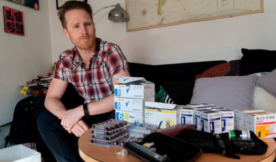 David Burns, 38, who has Type 1 diabetes, prepares his insulin pen to inject himself in his home in North London on February 24, 2019.