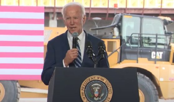 President Joe Biden speaks Tuesday at a TSMC semiconductor chip factory in Arizona.