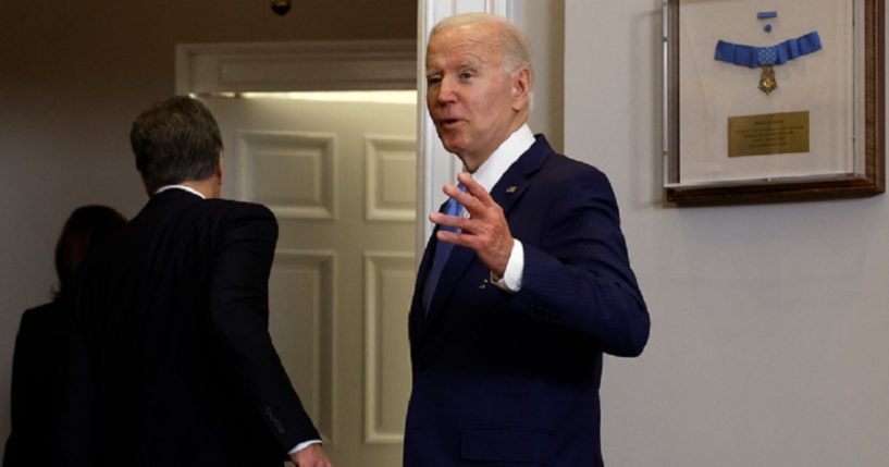 President Joe Biden leaves the Roosevelt Room of the White House on Thursday after remarks about the prisoner swap that freed Russian arms dealer Viktor Bout from a U.S. prison in return for sports star Brittney Griner.