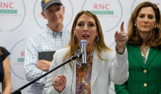 Republican National Committee chairman Ronna McDaniel speaks at an October rally in Doral Florida. Behind her are Florida Gov. Rick Scott and Rep. Maria Elvira Salazar.