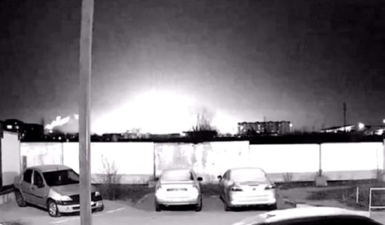 A still from a video showing a distant view of an explosion at a Russian airbase on Monday.