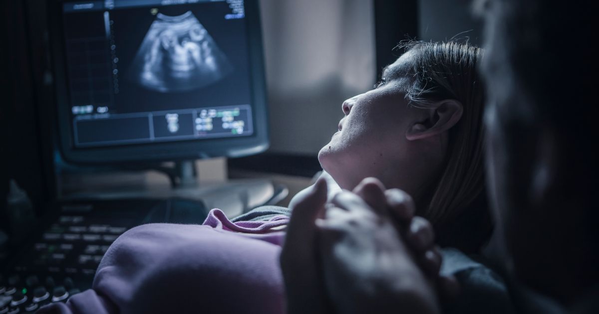 The above stock image is of someone getting a sonogram.