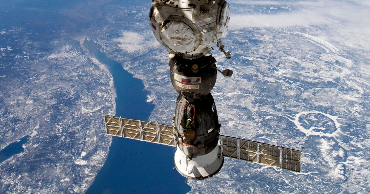 This undated handout photo taken by Russian cosmonaut Sergei Korsakov and released by Roscosmos State Space Corporation shows a Soyuz capsule of the International Space Station (ISS) during its fly.