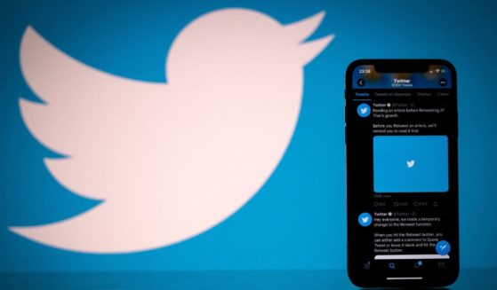 This photograph taken on Oct. 26, 2020, shows the logo of U.S. social network Twitter displayed on the screen of a smartphone.