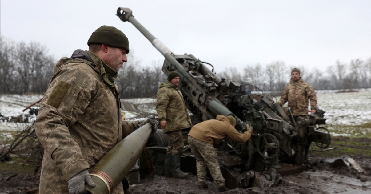 Ukrainian artillerymen fire an American M777 howitzer toward Russian positions in eastern Ukraine on Nov. 23.