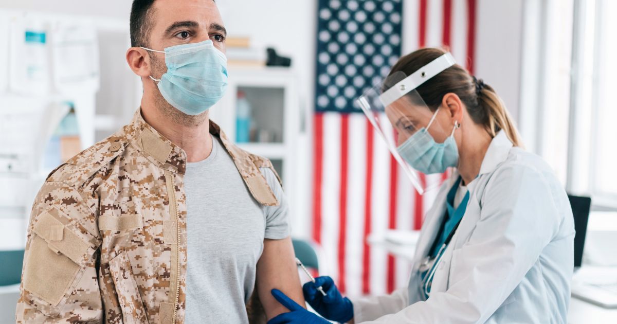 The above stock image is of a soldier receiving a vaccine.