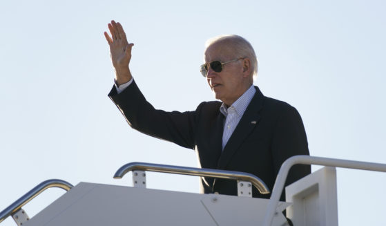 President Joe Biden boards Air Force One in El Paso, Texas, on Sunday.
