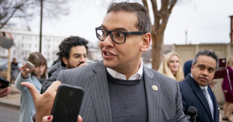 Rep. George Santos leaving a House GOP conference meeting