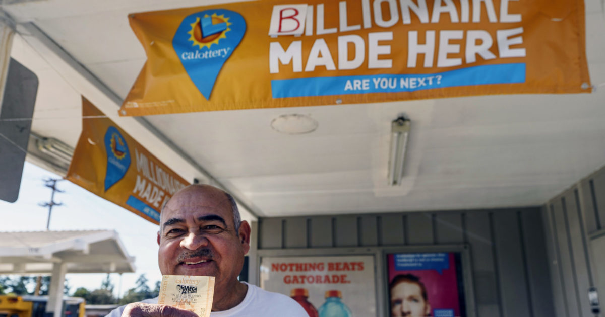 Jose Valles of California buying a SuperLotto Plus ticket