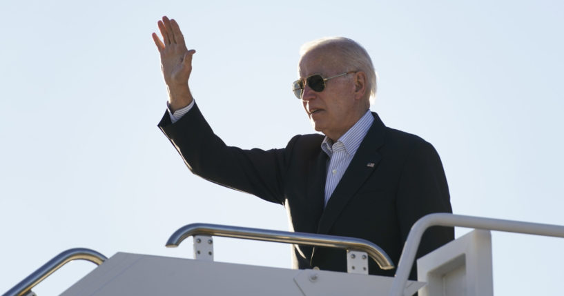 President Joe Biden waves before boarding Air Force One at El Paso International Airport in El Paso, Texas, January 8, 2023, to travel to Mexico City, Mexico.