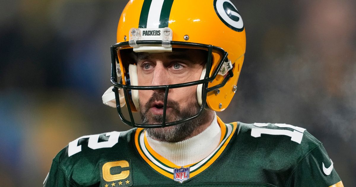 Aaron Rodgers of the Green Bay Packers warms up prior to a game against the Detroit Lions at Lambeau Field on Jan. 8.