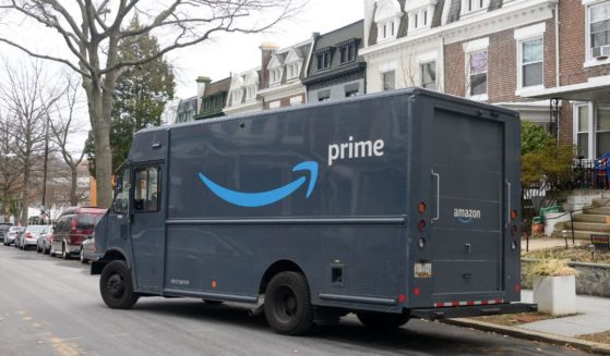 An Amazon delivery van drives away after making a delivery in Washington, D.C., on Feb. 22.