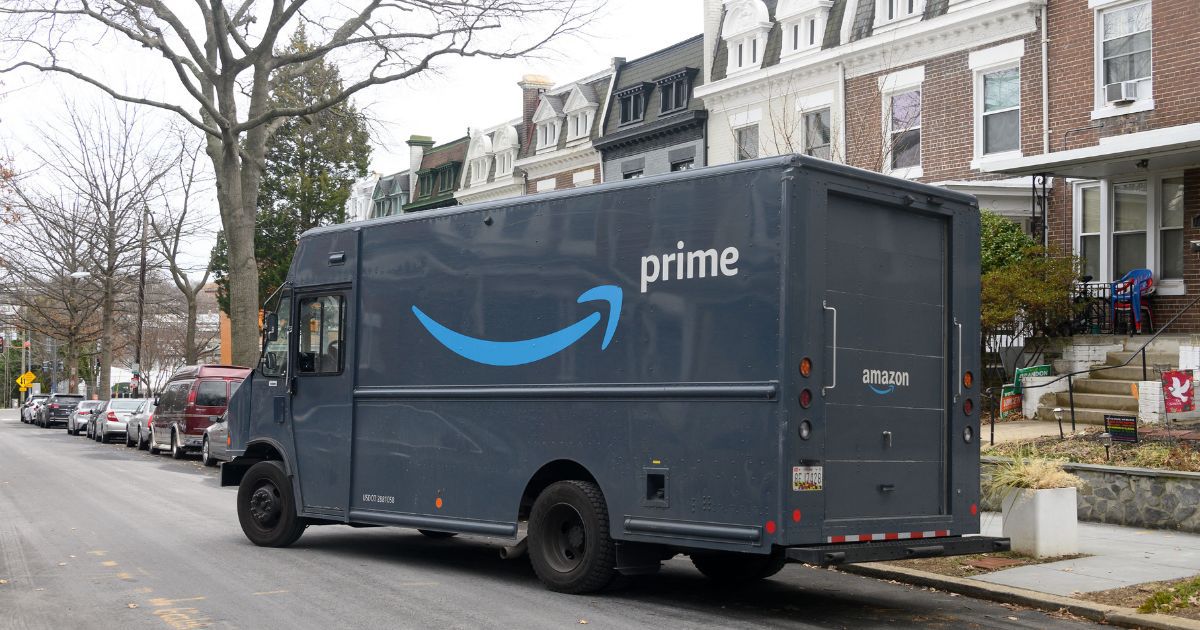 An Amazon delivery van drives away after making a delivery in Washington, D.C., on Feb. 22.