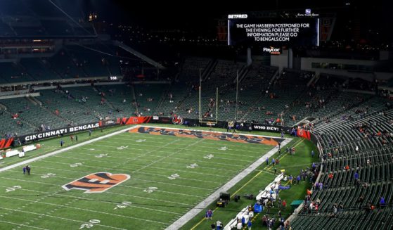 A Paycor Stadium video board reads that the game between the Buffalo Bills and the Cincinnati Bengals is suspended following the injury sustained by Bills safety Damar Hamlin in the first quarter Monday night.
