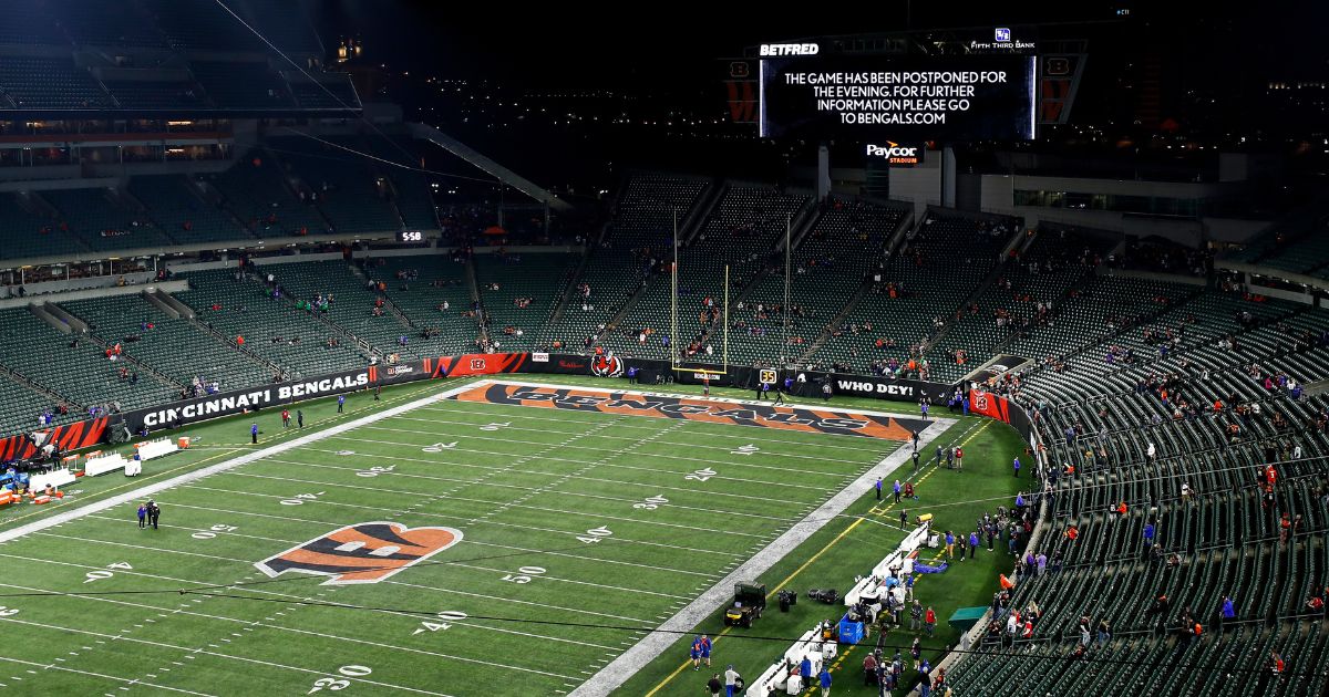A Paycor Stadium video board reads that the game between the Buffalo Bills and the Cincinnati Bengals is suspended following the injury sustained by Bills safety Damar Hamlin in the first quarter Monday night.