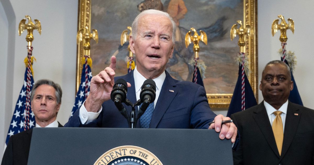 President Joe Biden, flanked by Secretary of State Antony Blinken, left, and Defense Secretary Lloyd Austin, speaks about U.S. support of Ukraine in its fight against Russia in the Roosevelt Room of the White House in Washington on Wednesday.