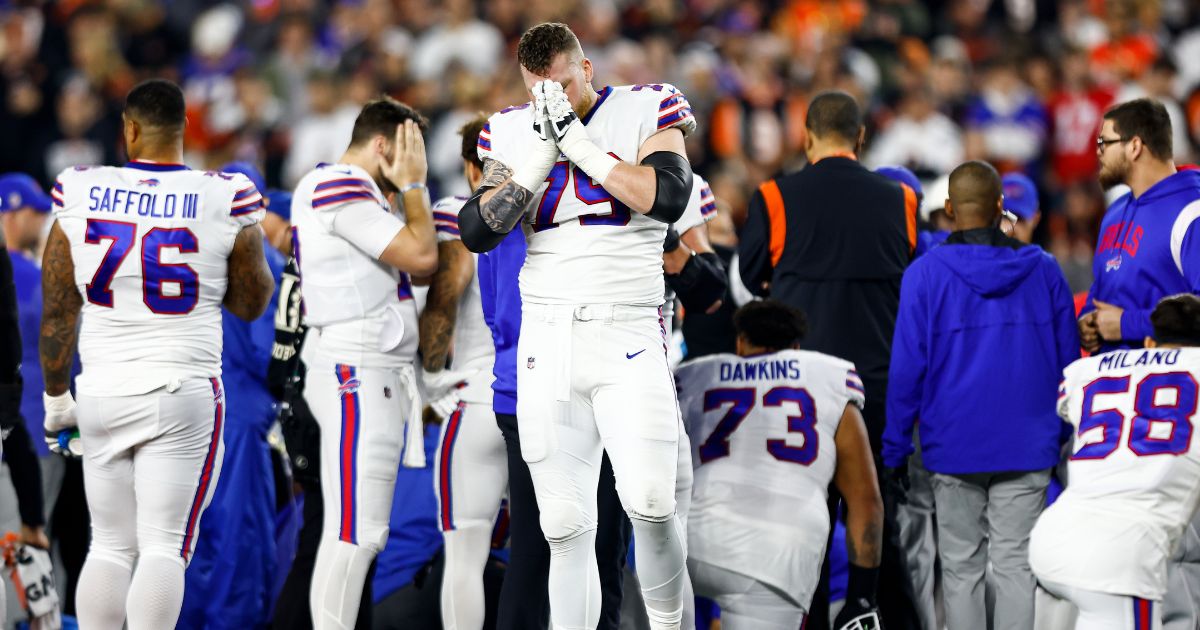 Spencer Brown of the Buffalo Bills reacts to an injury sustained by Damar Hamlin during the first quarter of an NFL football game against the Cincinnati Bengals at Paycor Stadium on Jan. 2 in Cincinnati, Ohio.