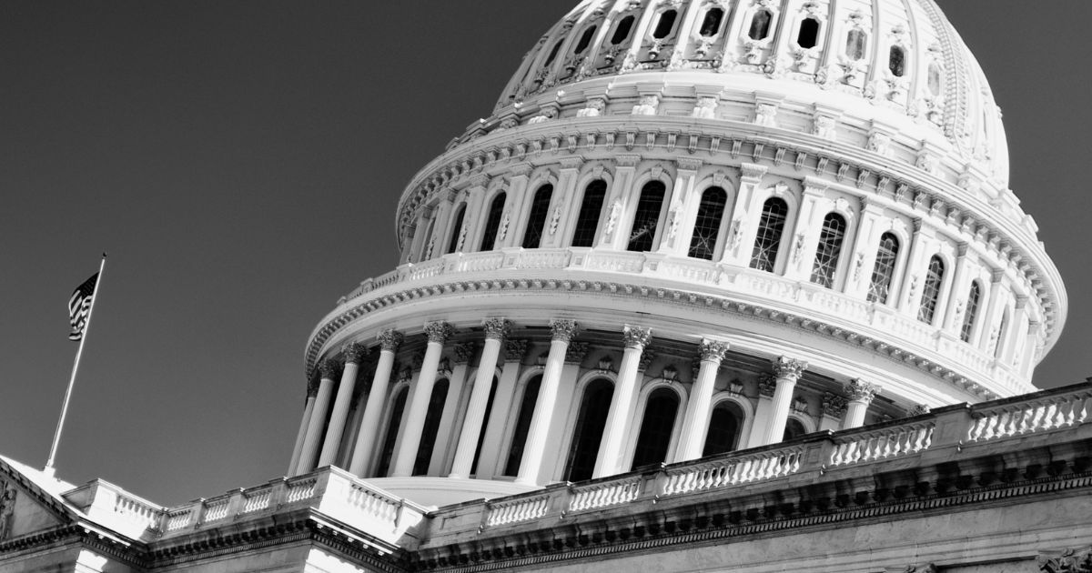 The U.S. Capitol in Washington, D.C., is pictured in black and white.