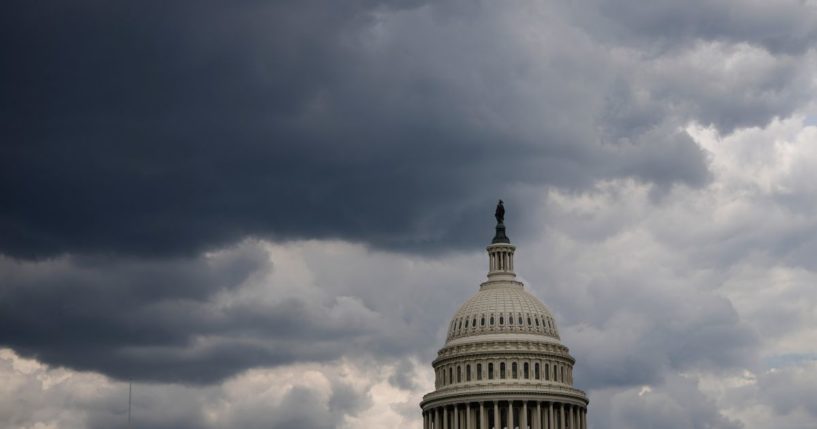 Dark clouds gather over the U.S. Capitol on May 17, 2021, in Washington, D.C.