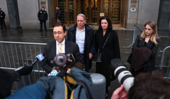 Charles McGonigal, the former head of counterintelligence for the FBI’s New York office, listens as his attorney Seth Ducharme gives a statement to the media after leaving court on Monday in New York City.
