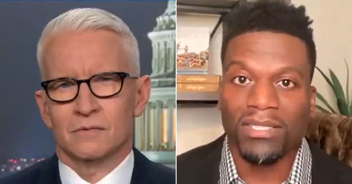 CNN's Anderson Cooper interviews former NFL player Benjamin Watson.