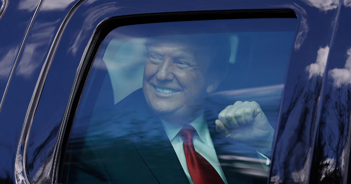 Former President Donald Trump waves to supporters in a file photo from January 2021. Former national security adviser John Bolton has announced he is running for the 2024 Republican presidential nomination, in direct competition with his former boss.