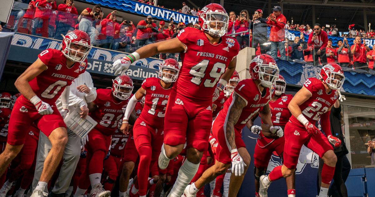 The Fresno State Bulldogs run out of the tunnel at the beginning of their LA Bowl contest against Washington State at SoFi Stadium in Los Angeles on Dec. 17. Fresno State won 29-6.