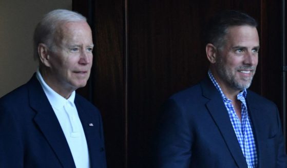 President Joe Biden, left, and Hunter Biden, right, leave the Holy Spirit Catholic Church after mass in Johns Island, South Carolina on Aug. 13, 2022.