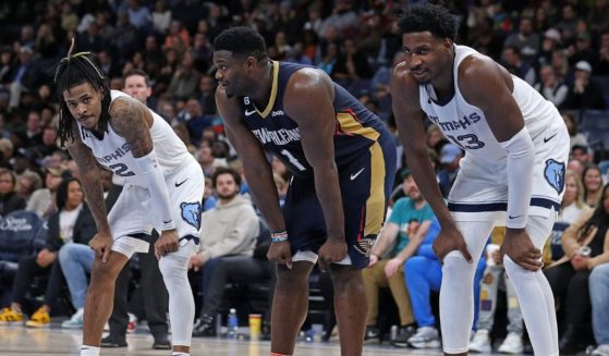 Ja Morant, Zion Williamson and Jaren Jackson Jr. are seen during an NBA game between the Memphis Grizzlies and the New Orleans Pelicans at FedExForum on Dec. 31, 2022, in Memphis, Tennessee.