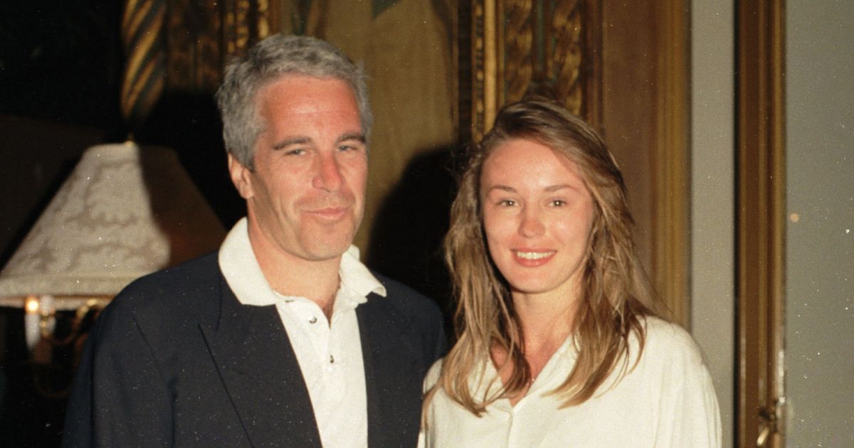 Jeffrey Epstein Celina Midelfart posing together during a reception at Mar-a-Lago
