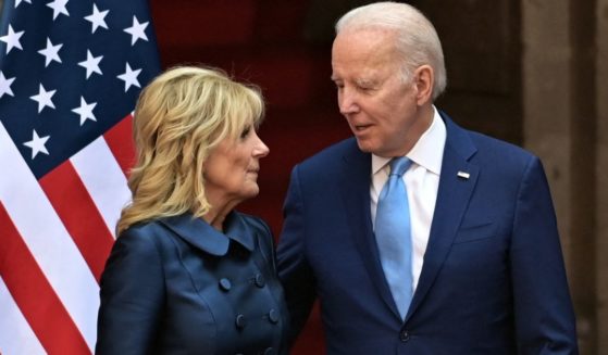 President Joe Biden, right, and first lady Jill Biden, left, pose for a family photo at the National Palace in Mexico City, Mexico, on Tuesday.