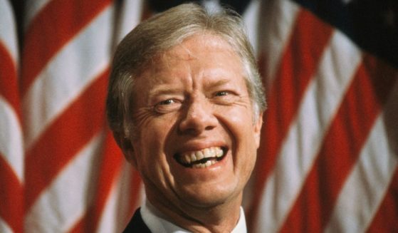 Then-President Jimmy Carter smiles during a town hall at North High School in Torrance, California, on Sept. 22, 1980.