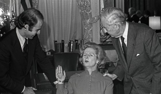 Eventual British Prime Minister Margaret Thatcher talks with U.S. Sens. Joseph Biden and John Sparkman in the U.S. Capitol's Foreign Relations Committee Room in Washington, D.C., on Sept. 18, 1975.