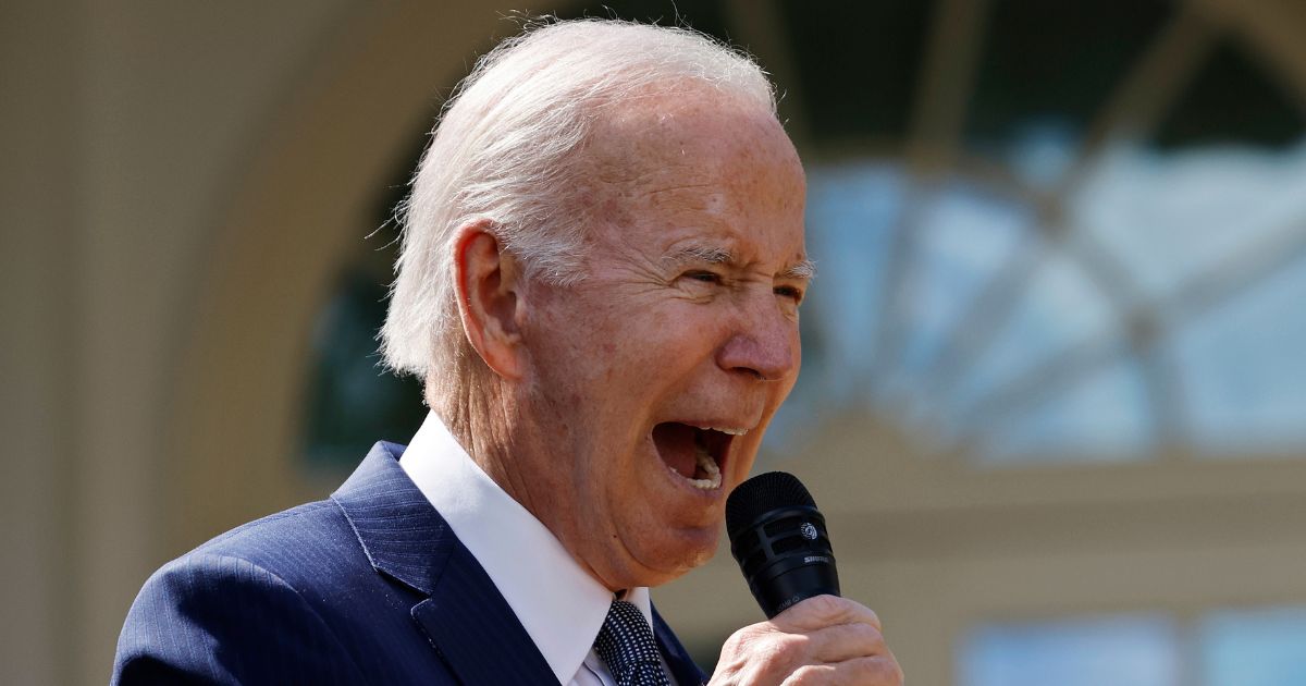 President Joe Biden shouts during an event in the Rose Garden at the White House in Washington on Sept. 27.