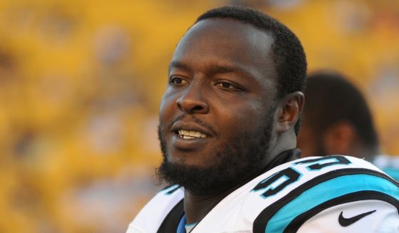 Charles Johnson, a defensive lineman for the Carolina Panthers, is seen in a file photo taken during a preseason game against the Pittsburgh Steelers in August 2012.