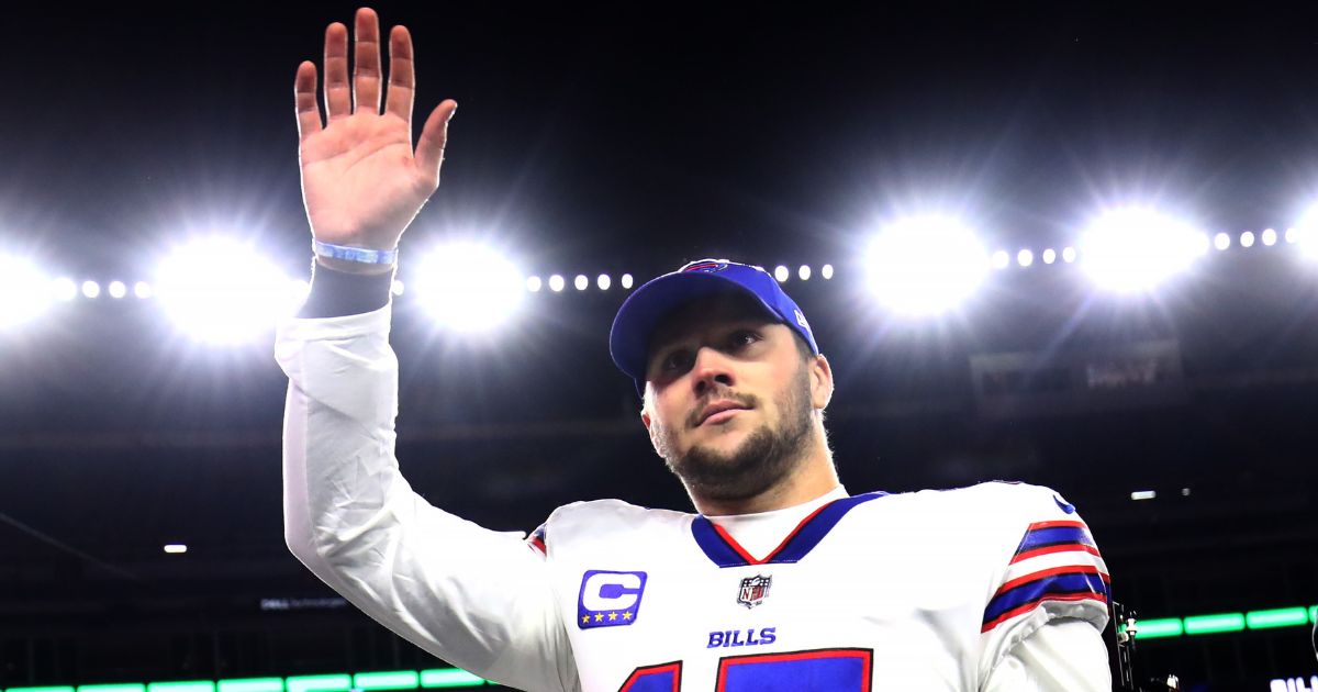 Buffalo Bills quarterback Josh Allen waves to fans following the Bills win over the New England Patriots on Dec. 1.