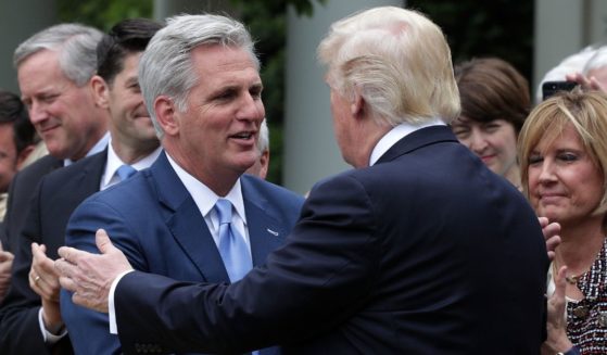 Then-President Donald Trump greets House Majority Leader Rep. Kevin McCarthy of California during a Rose Garden event May 4, 2017, at the White House.
