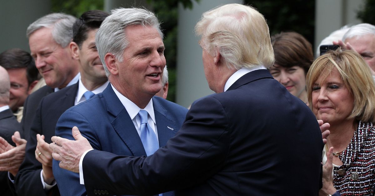 Then-President Donald Trump greets House Majority Leader Rep. Kevin McCarthy of California during a Rose Garden event May 4, 2017, at the White House.